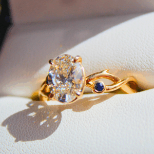2.00 CT Oval Diamond Ring with Sapphire Accents in 14K Yellow Gold Vine Setting
